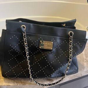 Bebe purse, black with gold detail, faux leather.